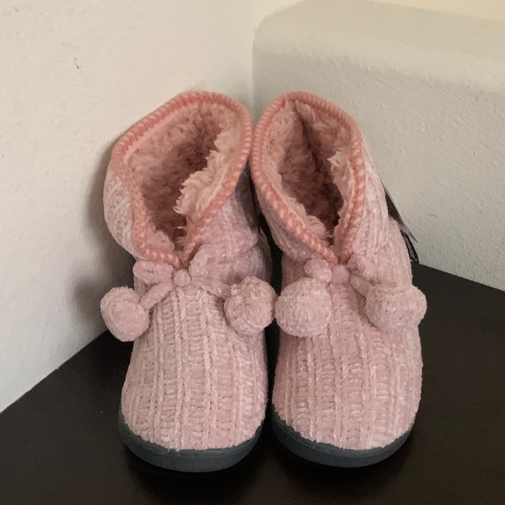 Muk Luks Women's Chenille Cable Knit Bootie Slippers in Soft Pink with Pom Poms.